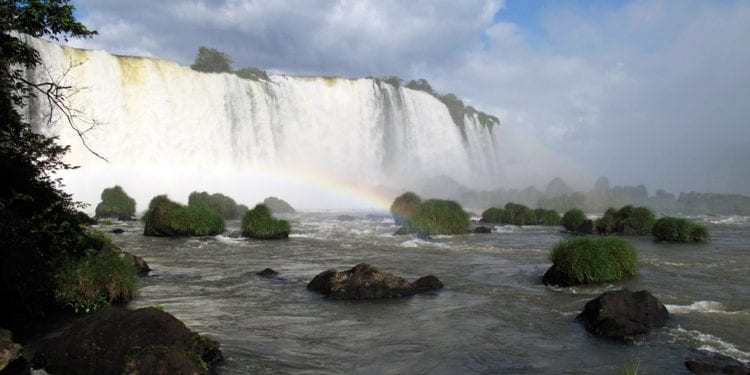 Brazil rainbow in Iguazu Falls Contours Travel