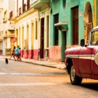 Street with Classic cars in Havana Cuba iStock Contours Travel