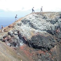 Contours Travel- people trekking in Volcano in Ecuador