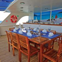 Outdoor dining Ocean Spray Galapagos Ecuador Haugan Contours Travel