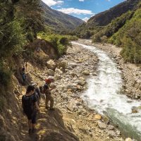 Peru Mountain Lodges Salkantay people walking Contours Travel