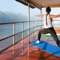 Yoga on deck Delfin I Cruise activities Amazon Iquitos Peru Contours Travel